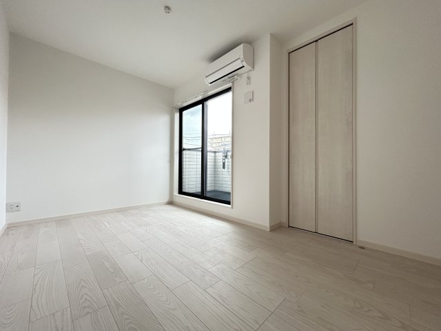 ヴェルメゾン三津屋中の居間写真