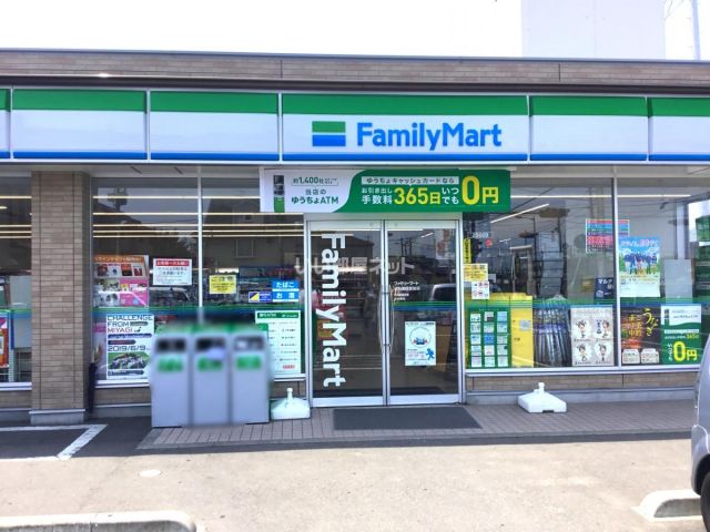 コンビニ　ファミリーマートウッディ南光台店（コンビニ）まで392m