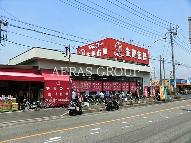スーパー　マルコー稲荷店（スーパー）まで725m