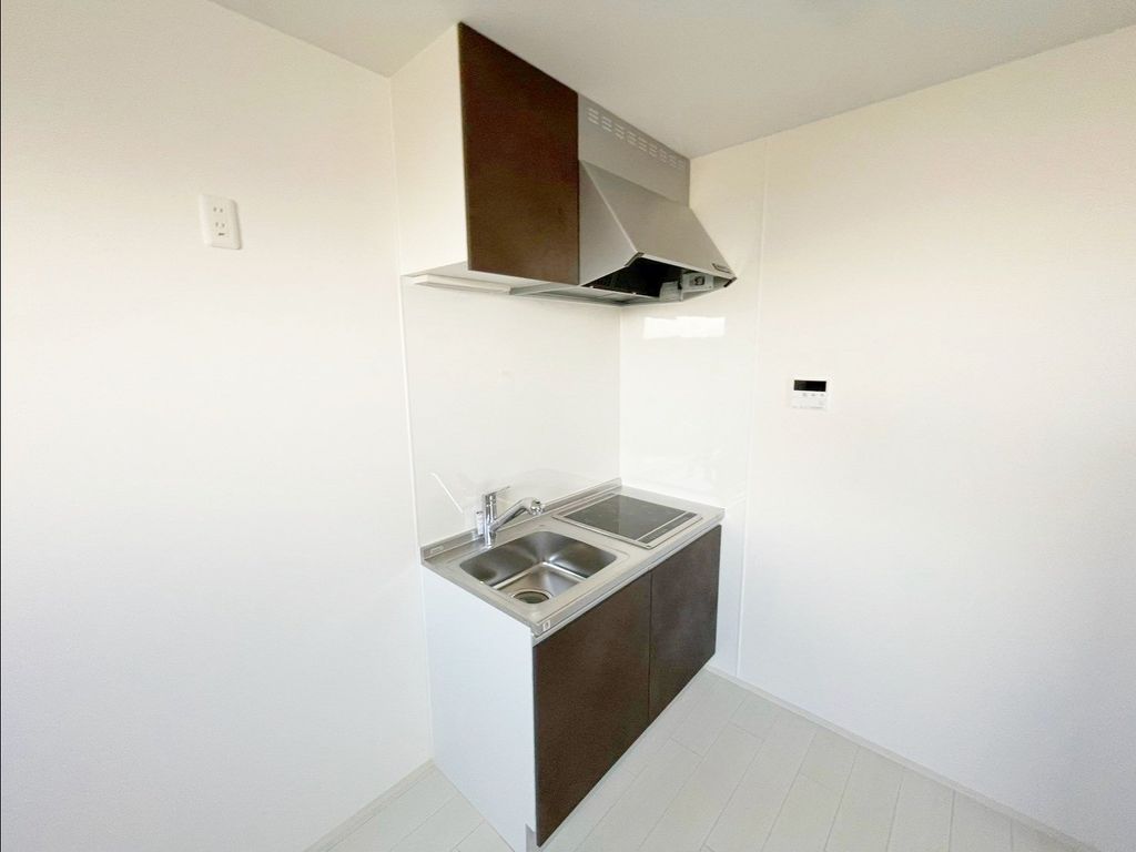 諏訪1丁目共同住宅のキッチン写真