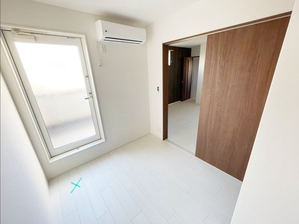 諏訪1丁目共同住宅の居間写真