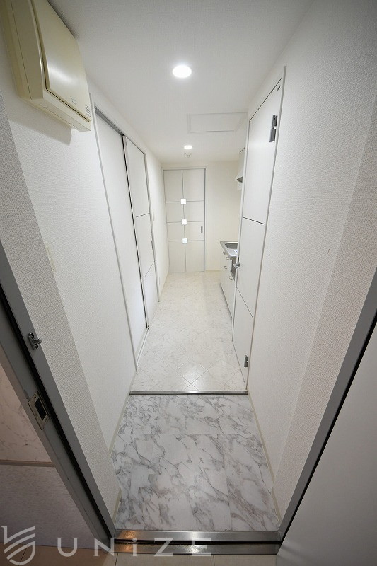 地下鉄東西線 菊水駅 徒歩7分 8階建 築15年の玄関写真