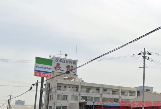 コンビニ　ファミリーマート茨木蔵垣内店（コンビニ）まで580m