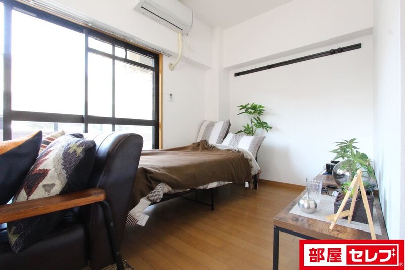 居室・リビング　２０５号室の写真引用。