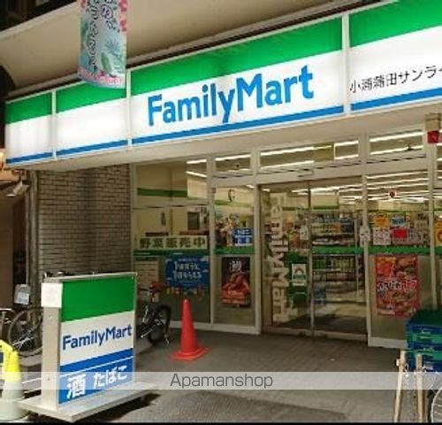 コンビニ　ファミリーマート 小浦蒲田サンライズ通り店（コンビニ）まで389m