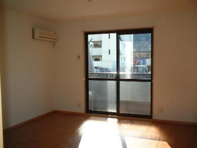 居室・リビング　メナージュＡ棟Ａ２０３（洋室）