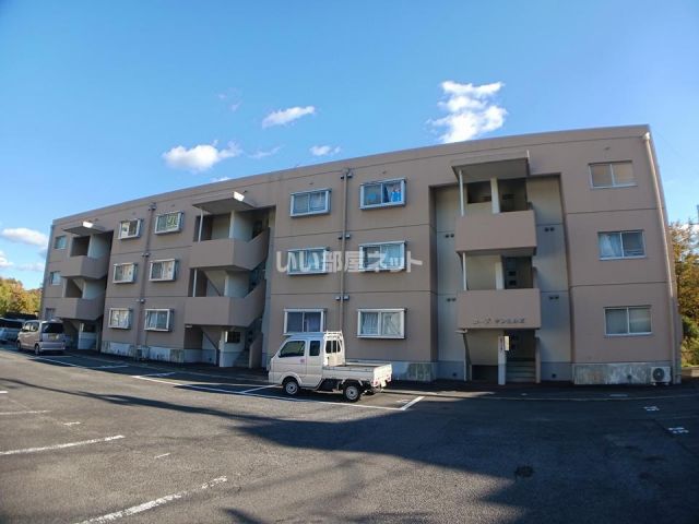 名張市蔵持町原出のマンションの建物外観