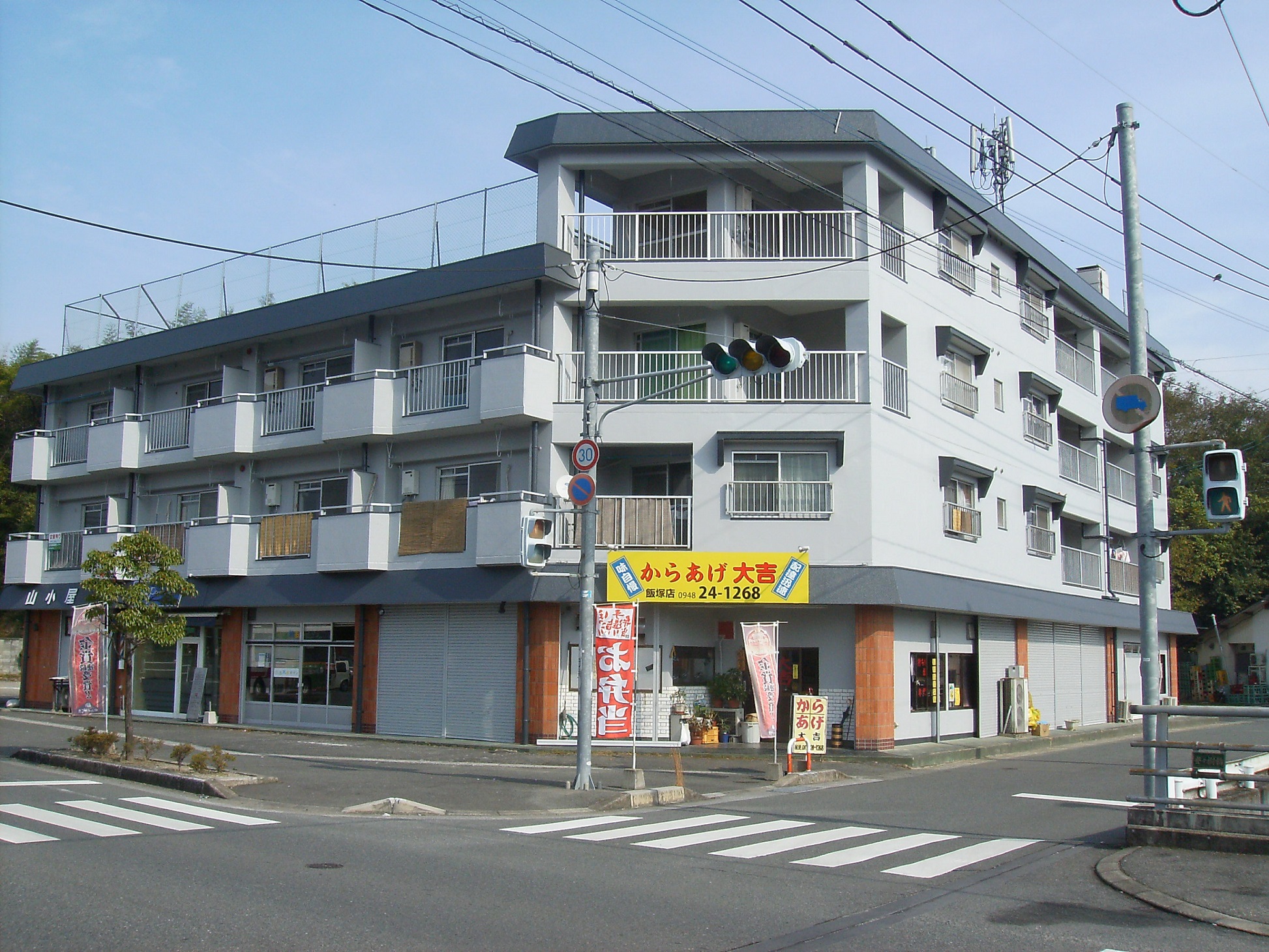 飯塚市潤野のマンションの建物外観