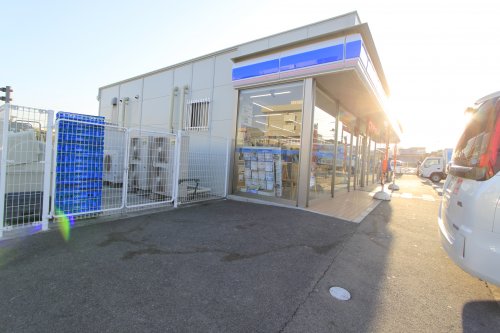 コンビニ　ローソン香芝本町店（コンビニ）まで710m