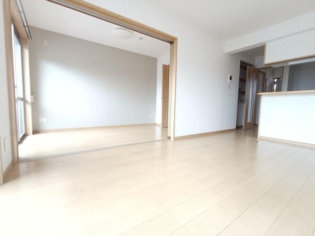 サンハイツアイタウン天辰A棟の居間写真