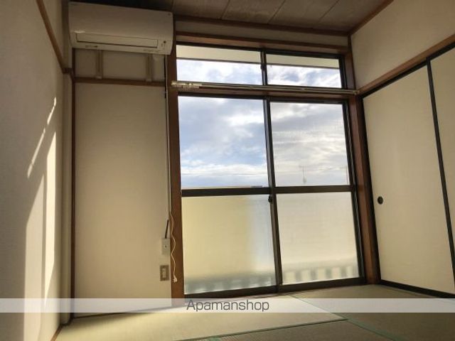 塩友ハイツの居間写真