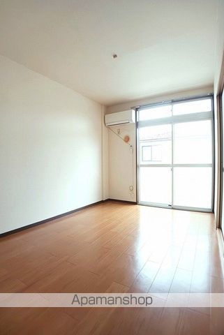 クローバーヒルズIIの居間写真