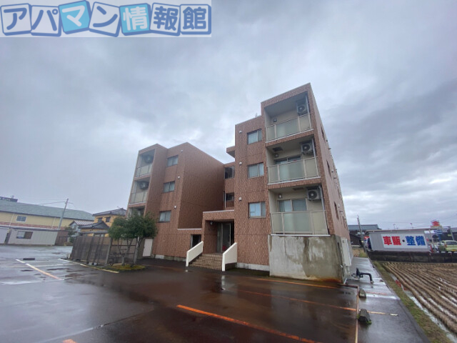 新潟市西蒲区漆山のマンションの建物外観