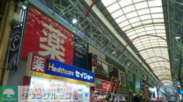 ドラックストア　ヘルスケアセイジョー弘明寺店（ドラッグストア）まで590m