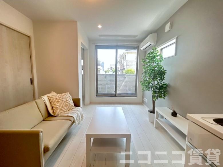 居室・リビング　モデルルームの写真のため、現状を優先致します。