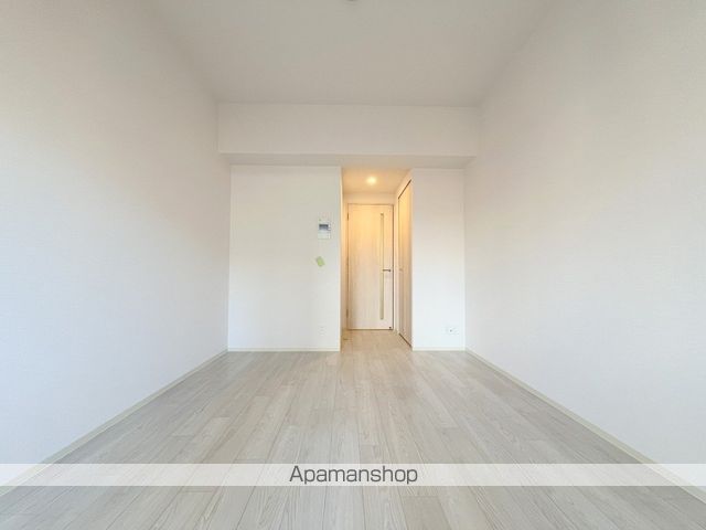 フォーリアライズ北三国ヶ丘の居間写真