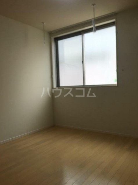 プランドール前野町の居間写真