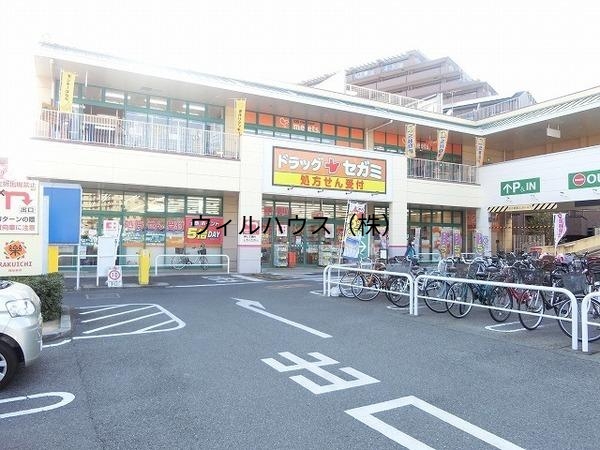 ドラックストア　ドラッグセガミ上野芝楽市店（ドラッグストア）まで1021m