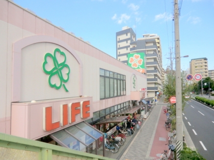 スーパー　ライフ十三東店（スーパー）まで516m