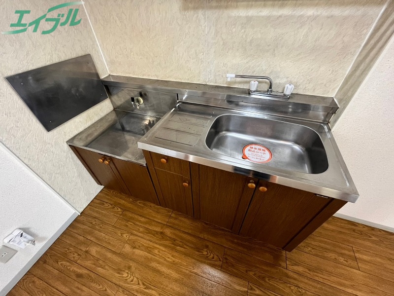 ベルファミールA棟のキッチン写真