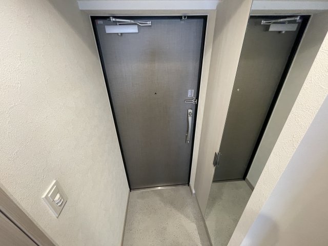 プレサンス塚本ベラビィの玄関写真