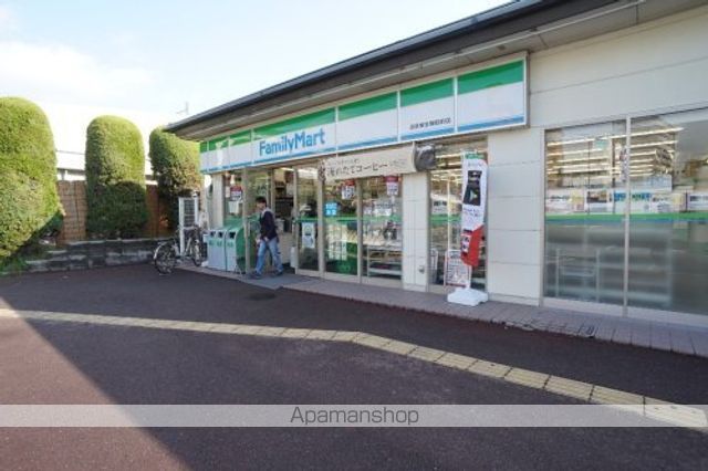 コンビニ　ファミリーマート　近鉄東生駒駅前店（コンビニ）まで519m