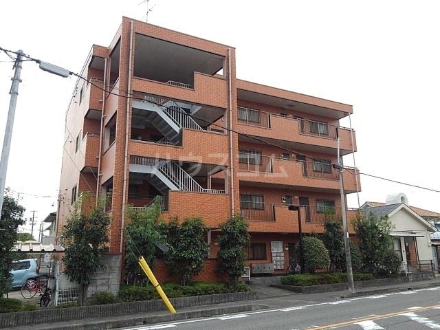北名古屋市六ツ師のマンションの建物外観