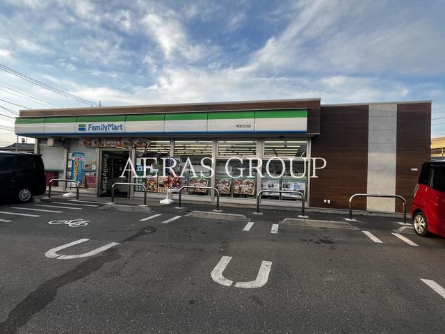 コンビニ　ファミリーマート 草加北谷店（コンビニ）まで386m