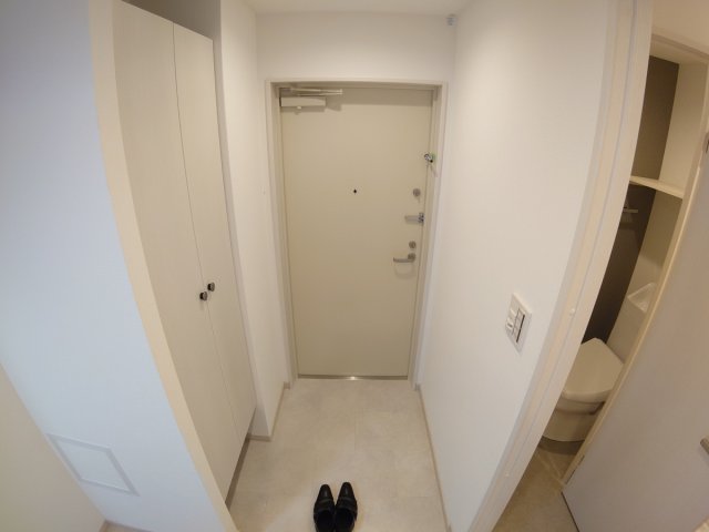 ウェルスクエア池田井口堂の玄関写真