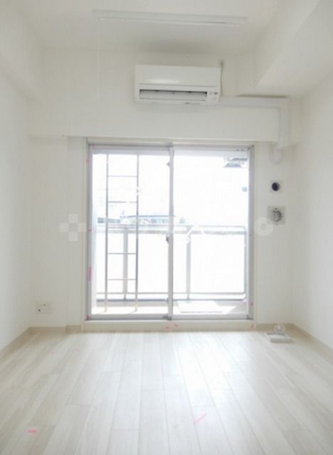 エステムコート梅田茶屋町IIIネクスタの居間写真
