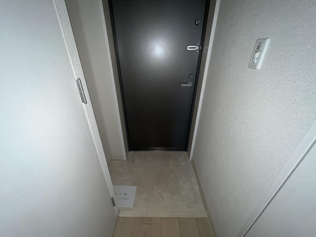 コンフォートEXE新田ステーションの玄関写真