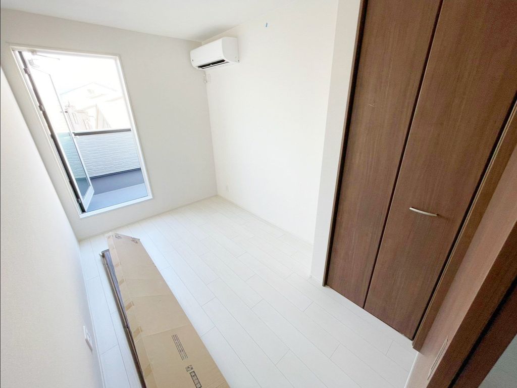 諏訪1丁目共同住宅の居間写真