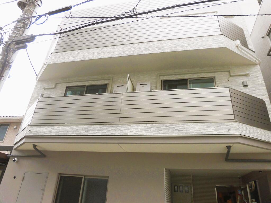 建物外観　1階RC・2~3階居住性に優れた2×4