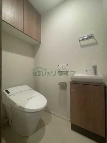 トイレ　参考写真：同じ棟・同じ間取りの写真