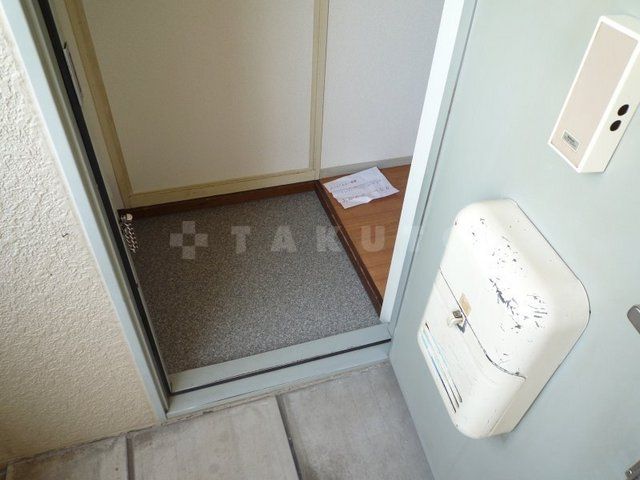 パセオ豊里B棟の玄関写真