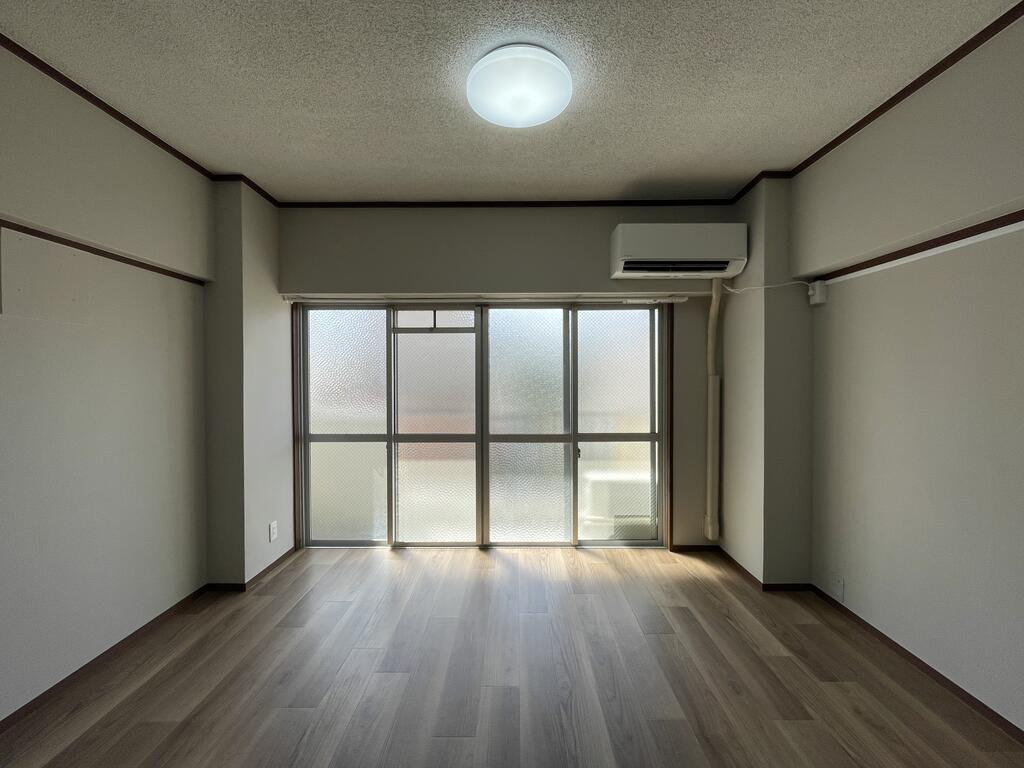 アシスト第2福井マンションの居間写真