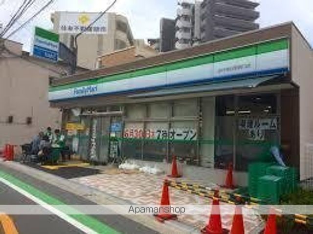 コンビニ　ファミリーマートＪＲ千里丘駅西口店（コンビニ）まで55m
