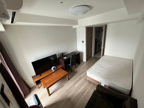 居室・リビング　※別号室のお写真です。