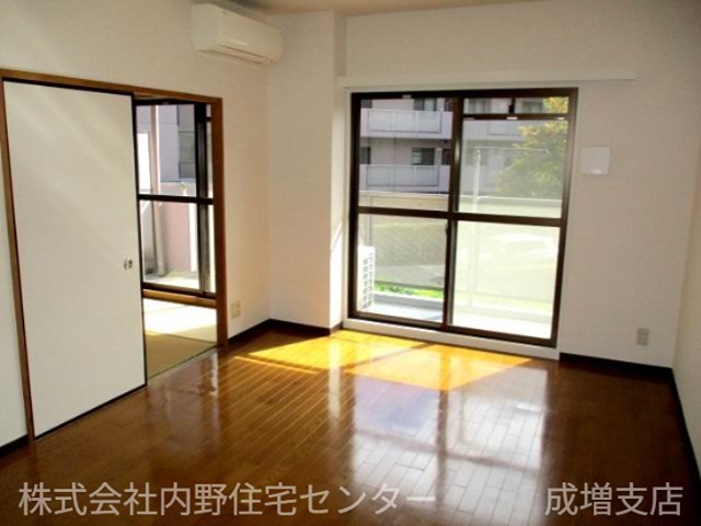 プレステージ平和台1番館の居間写真