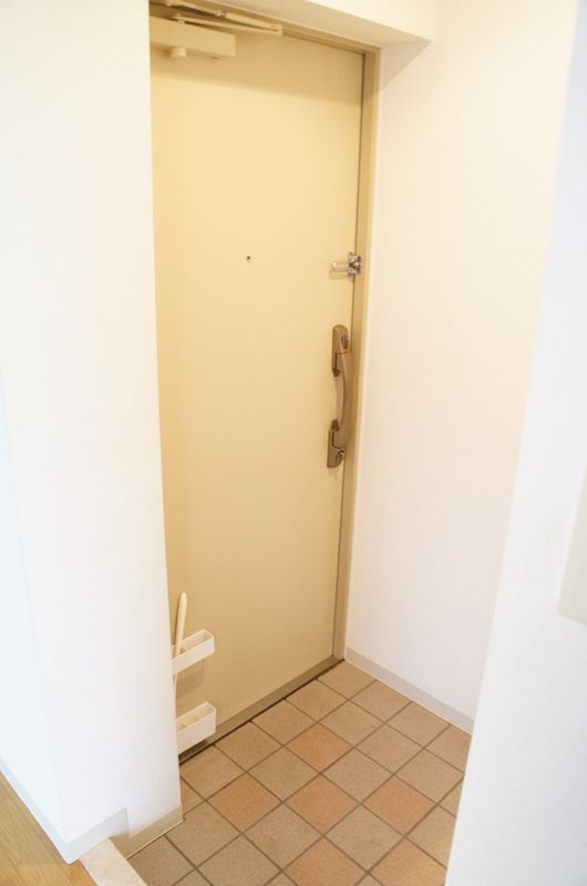 玄関　※退去前の写真となります。
