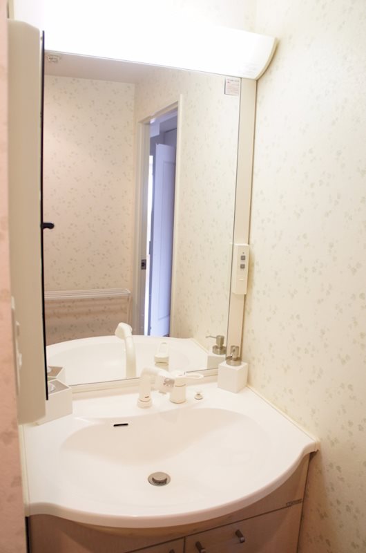 洗面設備　※退去前の写真となります。