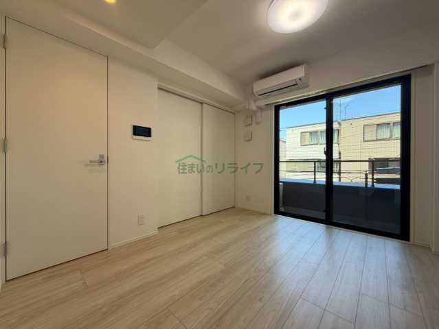 ACP Residence 中野新橋の居間写真