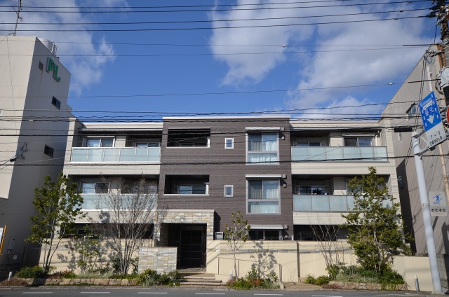 広島市西区庚午北のマンションの建物外観