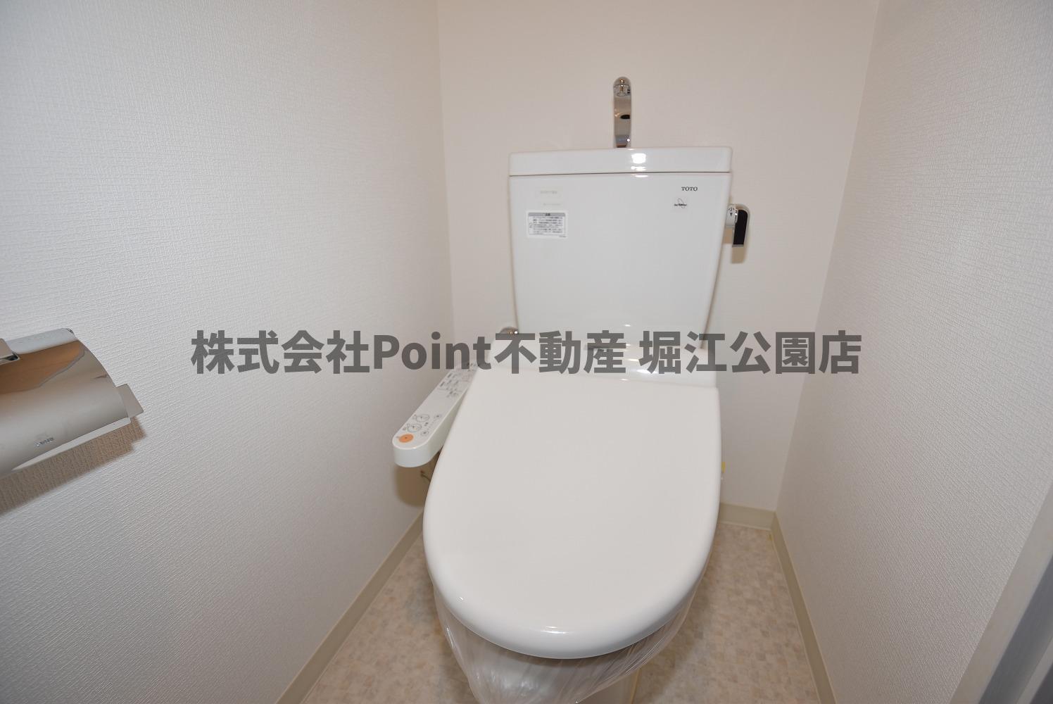 地下鉄四つ橋線 肥後橋駅 徒歩10分 11階建 築15年のトイレ写真