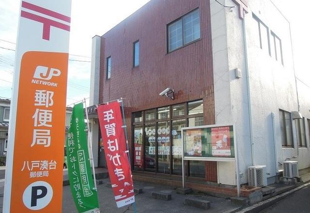 コンビニ　ファミリーマート八戸湊鮫ノ口店（コンビニ）まで450m