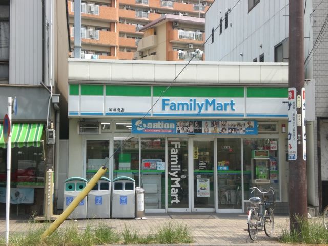 コンビニ　ファミリーマート（コンビニ）まで990m