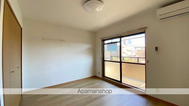 パレスコンフォート学南町の居間写真