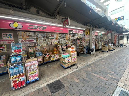 ドラックストア　ニシイチ薬局　アミング潮江店（ドラッグストア）まで404m