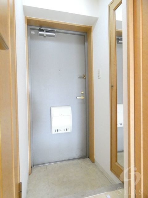 ＪＲ片町線 住道駅 徒歩12分 6階建 築27年の玄関写真