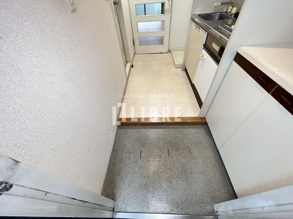 ＪＲ中央線 日野駅 徒歩18分 3階建 築38年の玄関写真
